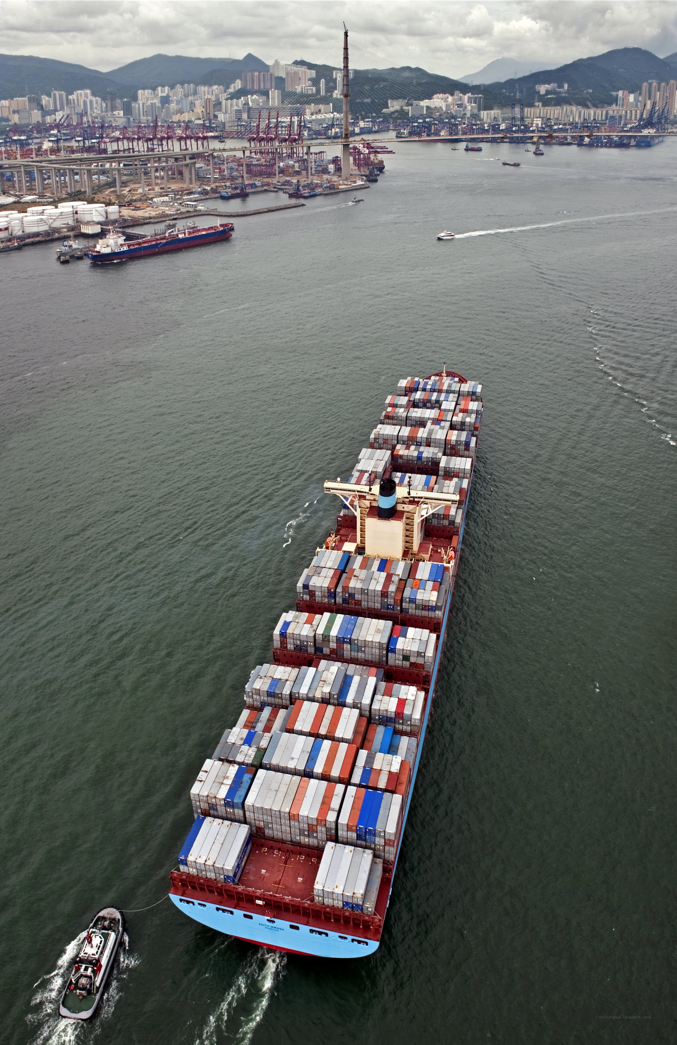 Container ship in busy port