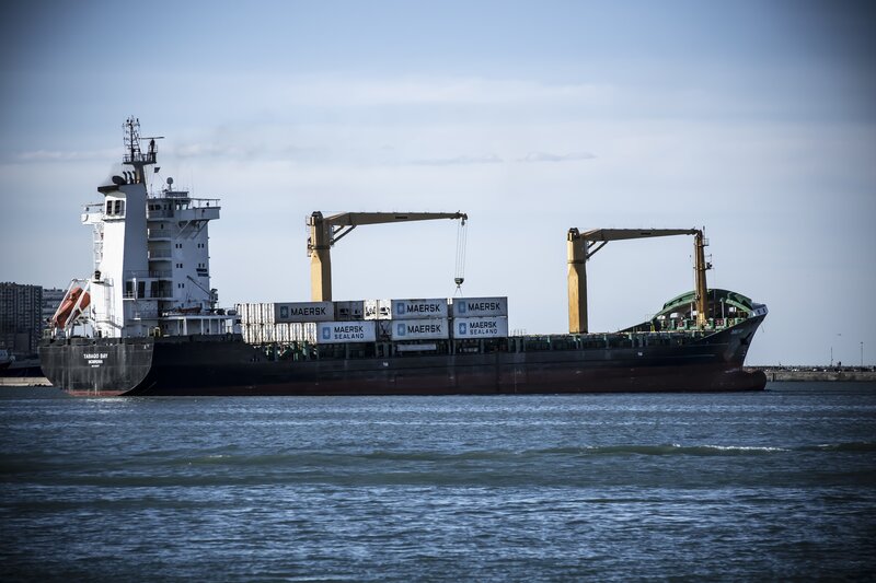 Container Ship in Harbor — Blue, Calm, Afternoon