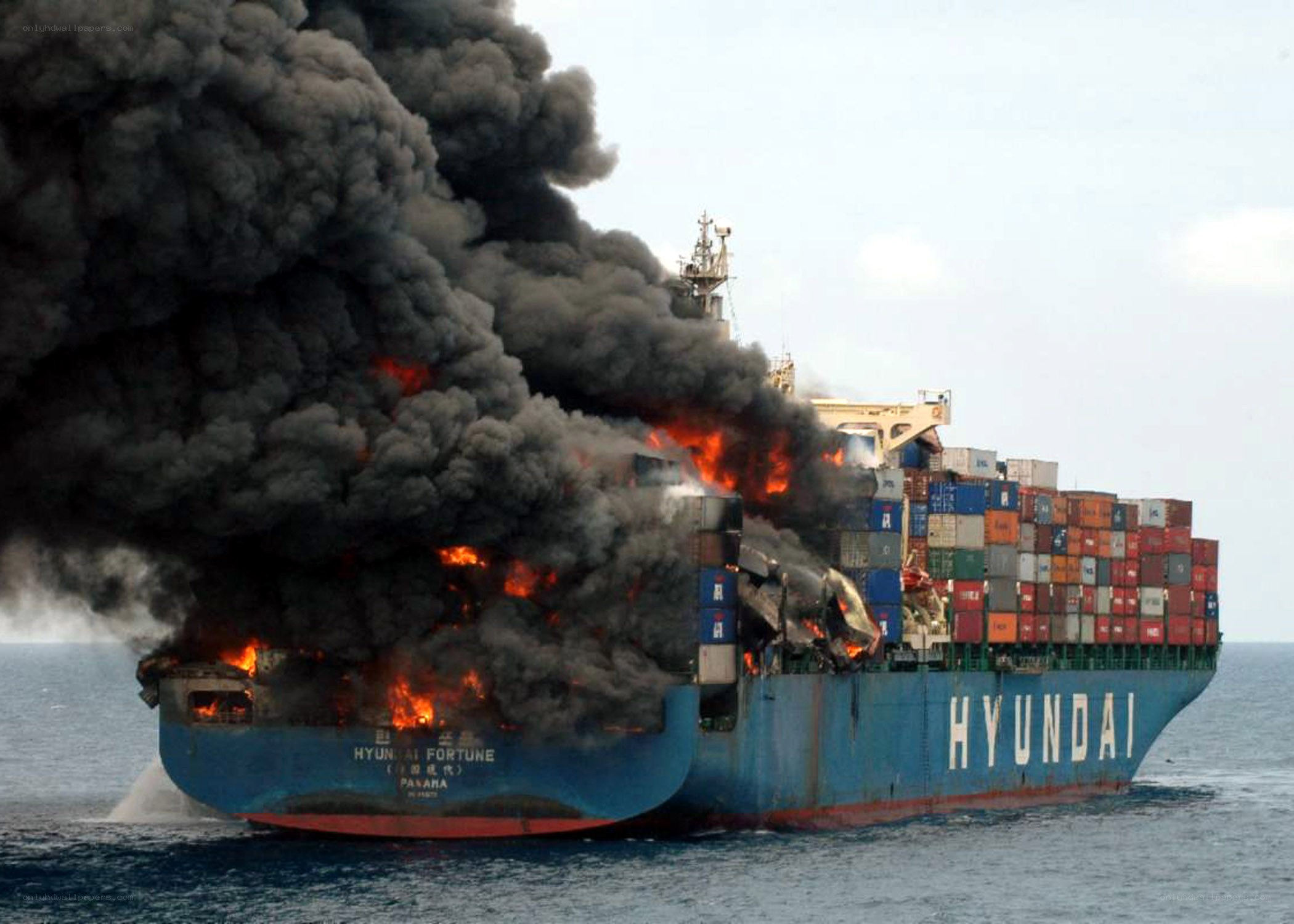 Container ship on fire at sea