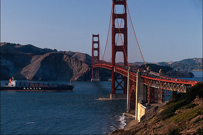 Container Ship under Bridge — Red, Serene