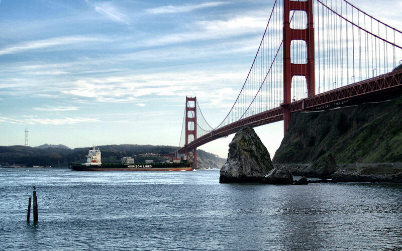 Container Ship under Bridge — Red