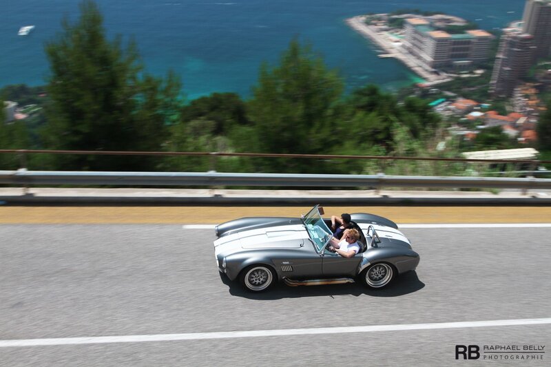 convertible car on coastal road