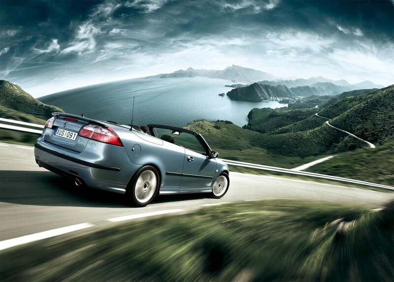 convertible car on coastal road