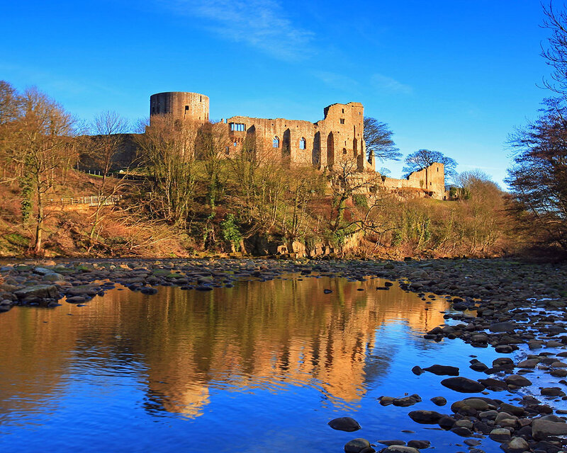 Conwy Castle reflected in river