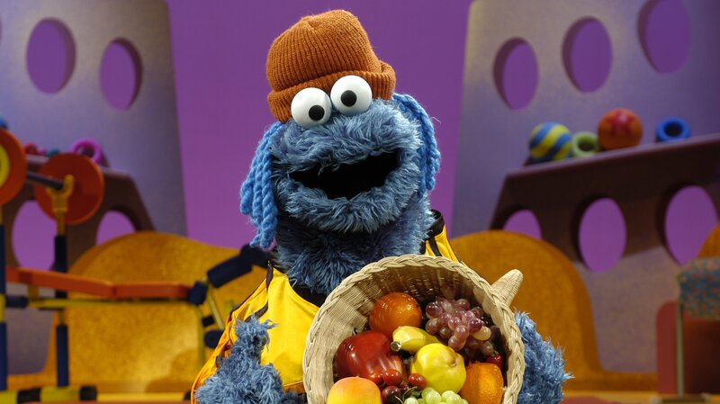 Cookie Monster with fruit basket