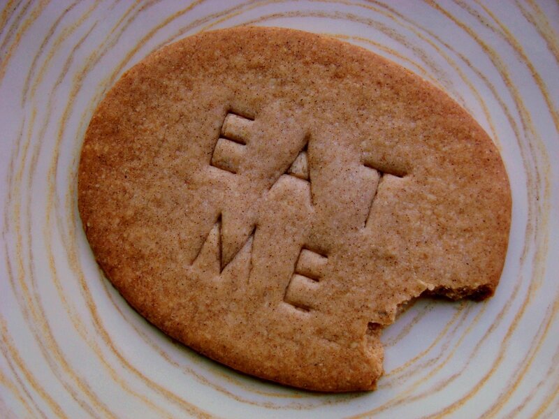 cookie with 'eat me' text