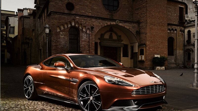 Copper Aston Martin in historic square