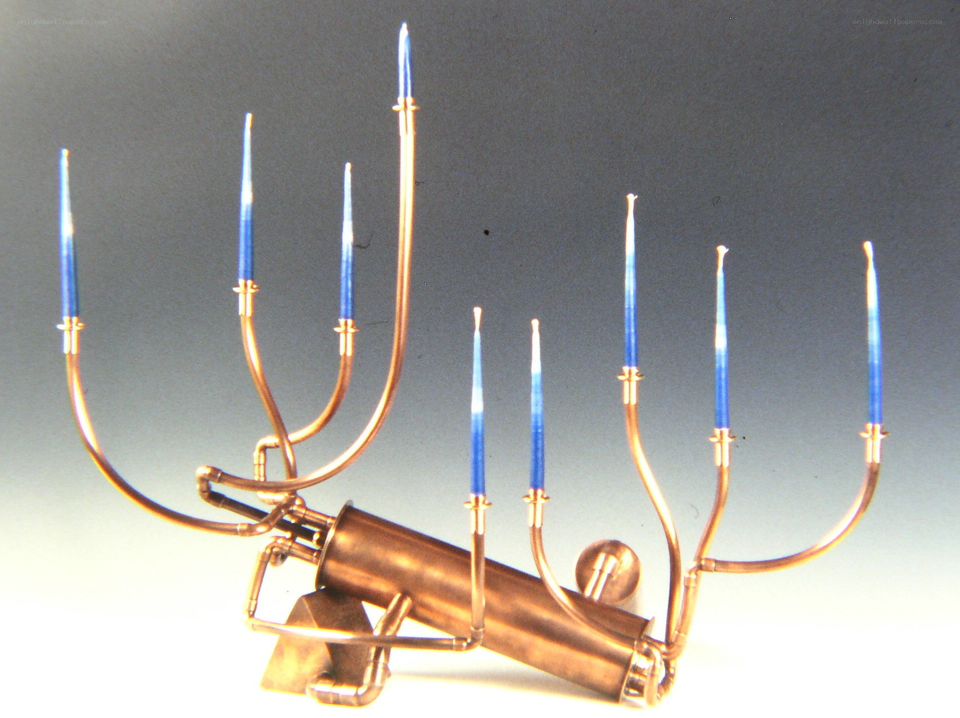 Copper candle holder with blue candles