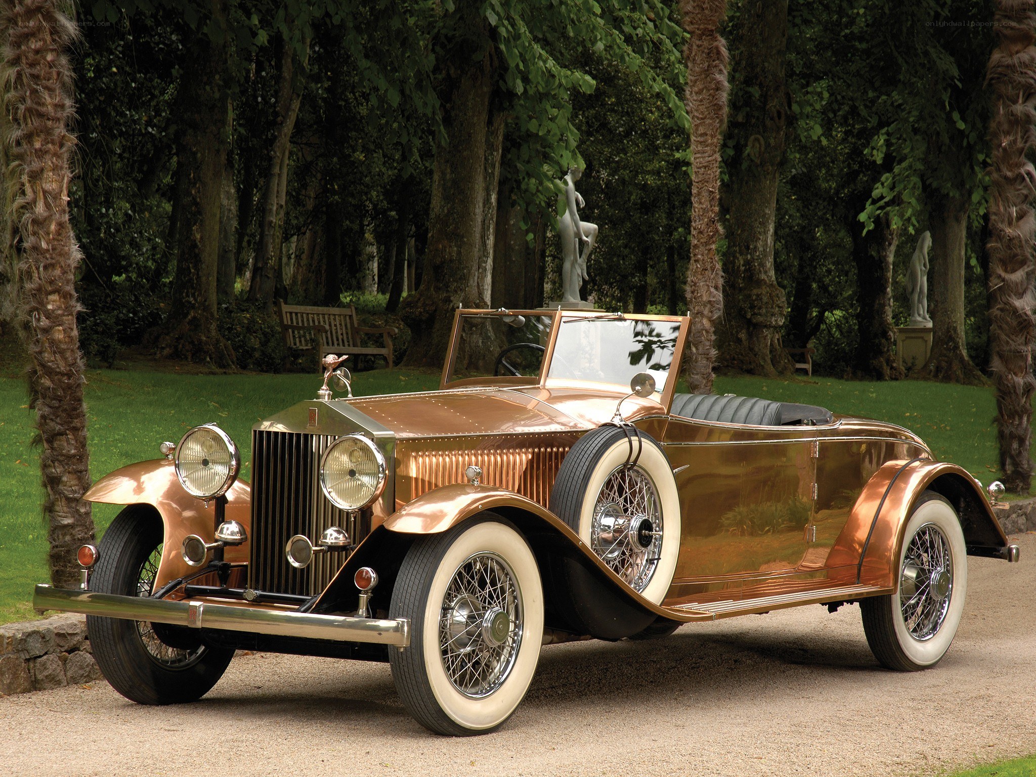 Copper Rolls-Royce in garden