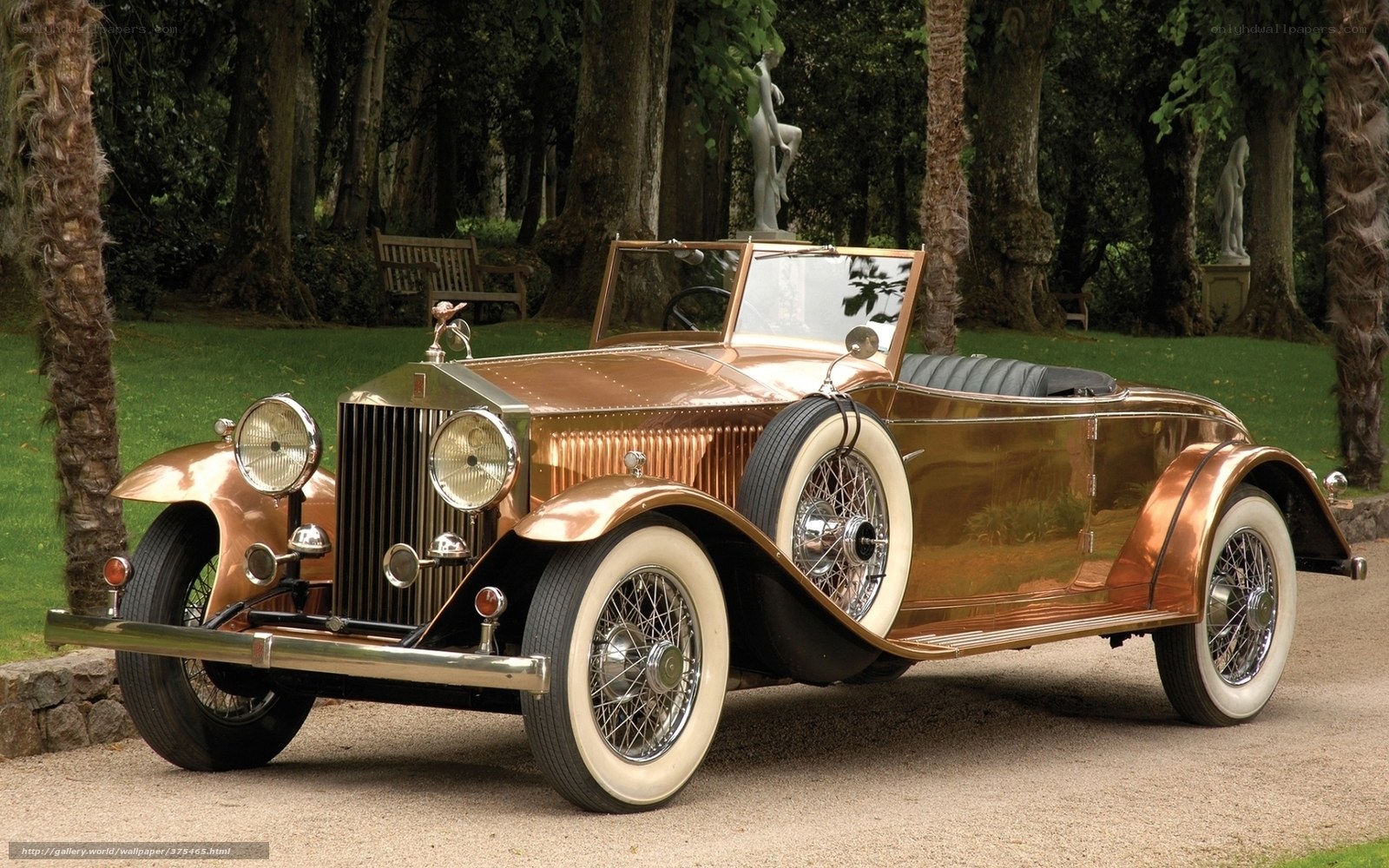 Copper Rolls-Royce in garden