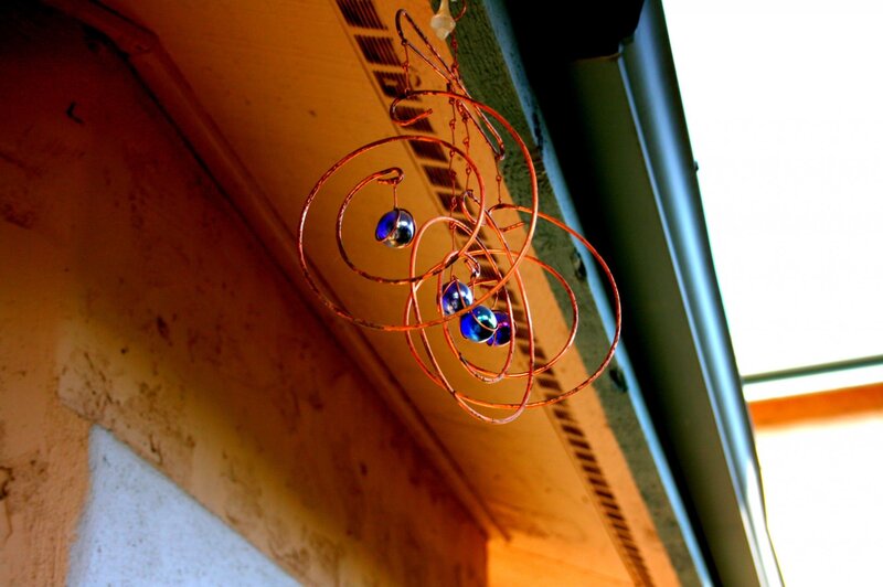 Copper wind chime with blue beads