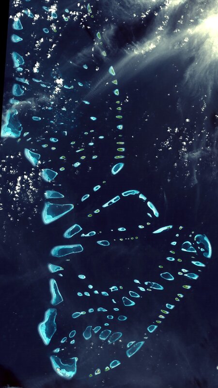 Coral Atolls in Ocean — Blue, Serene, Photograph