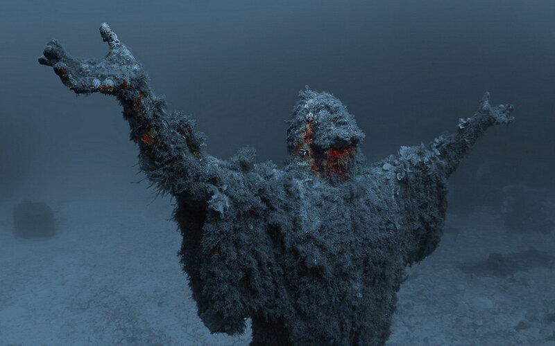 Coral-covered Statue