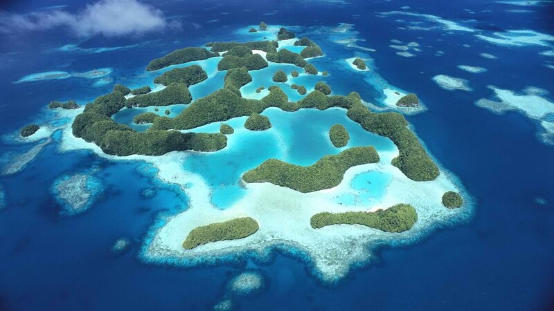 Coral Islands in Ocean — Blue, Serene, Afternoon, Photograph