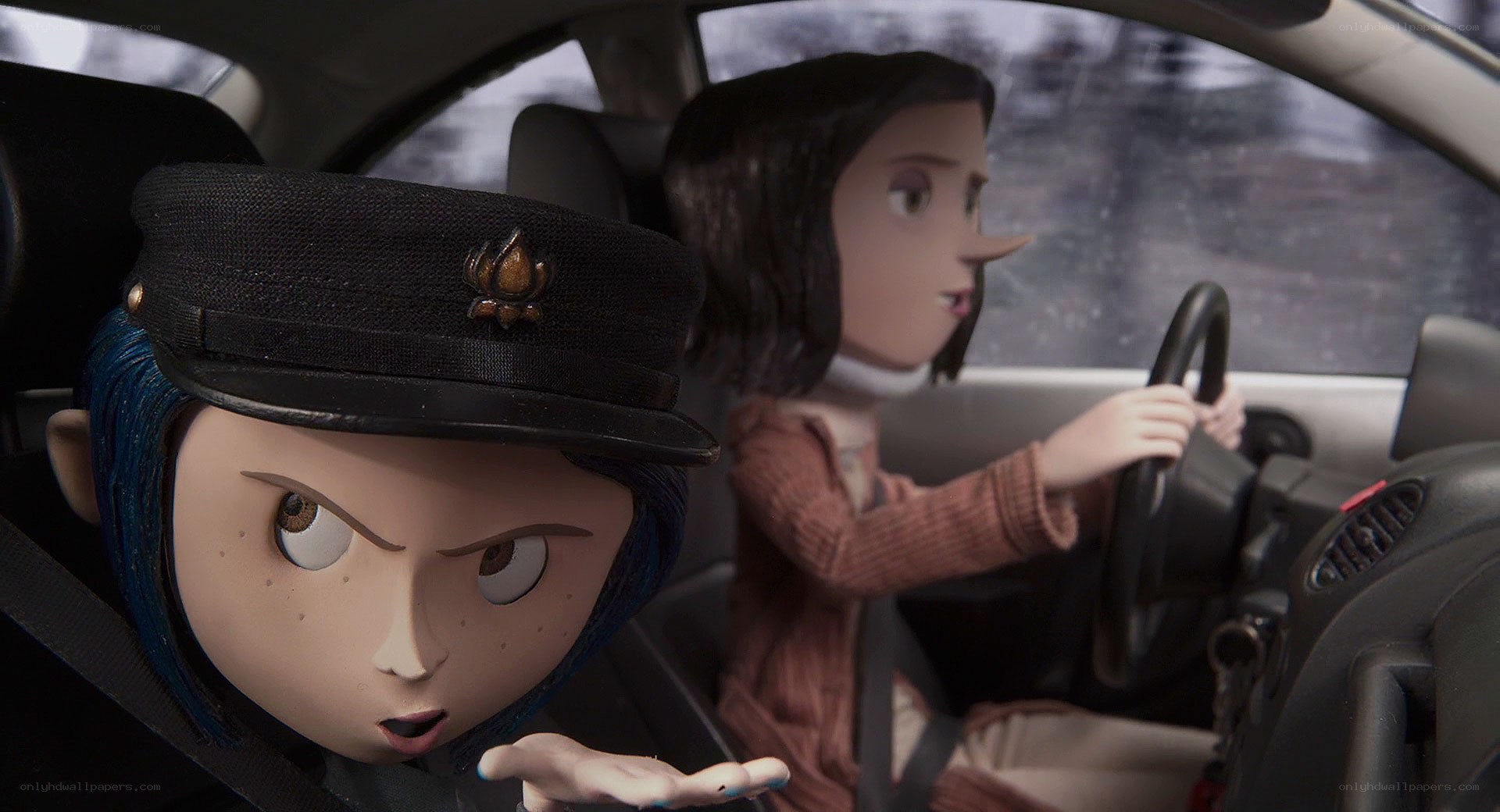 Coraline in a car