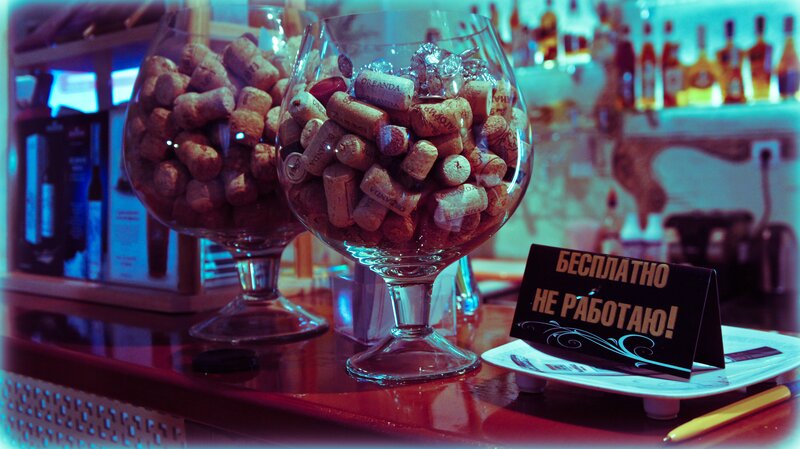 Cork-filled glass bowls at bar