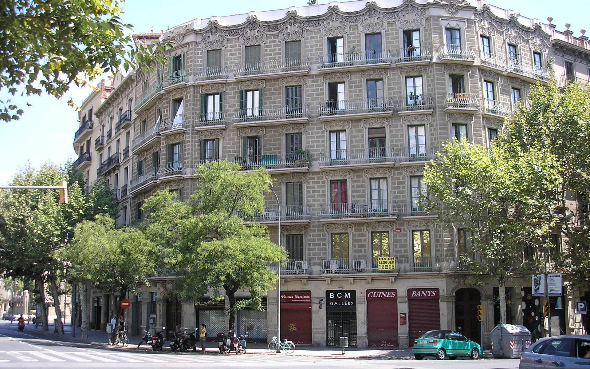 Corner building with shops in Barcelona