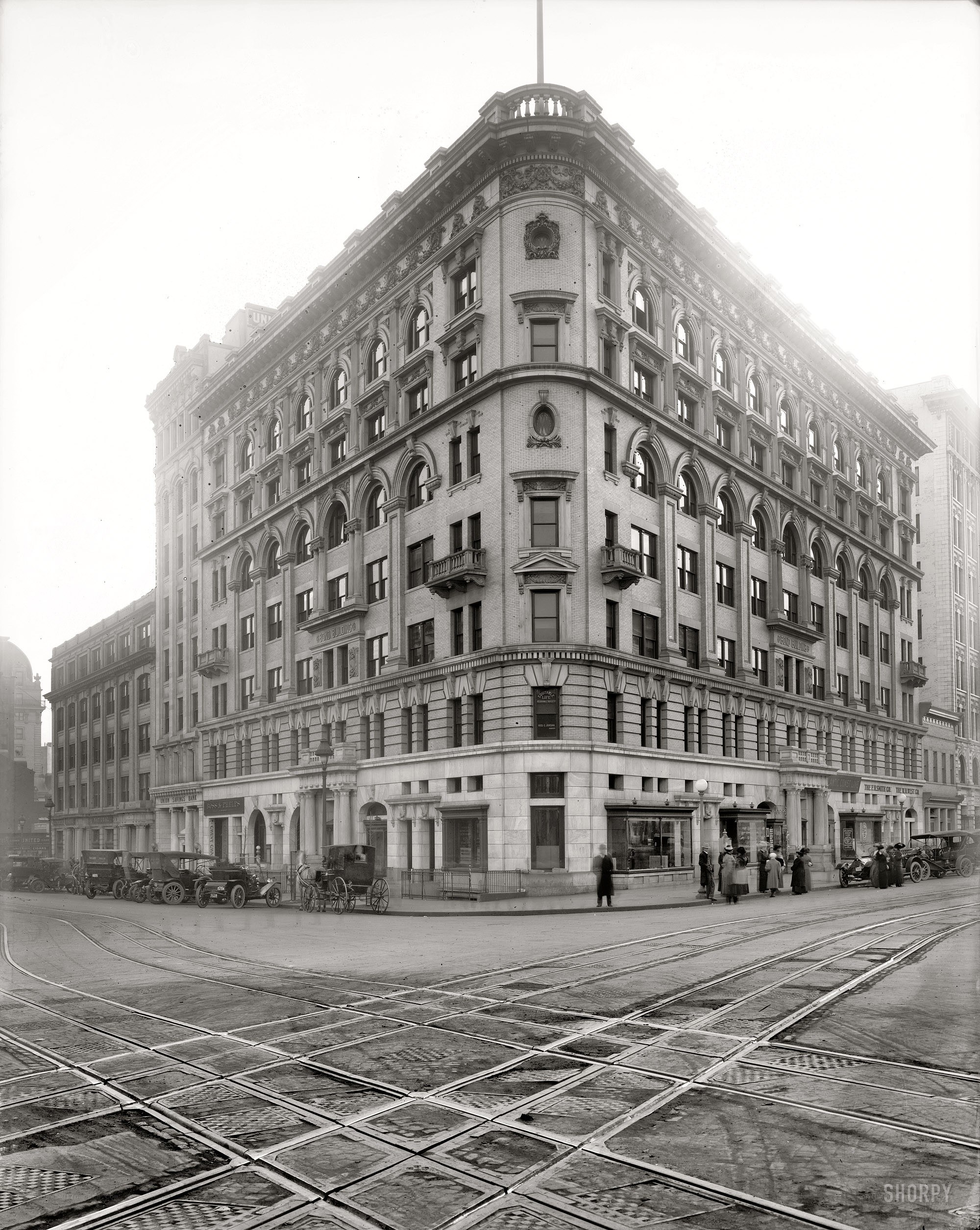 Corner building with streetcars