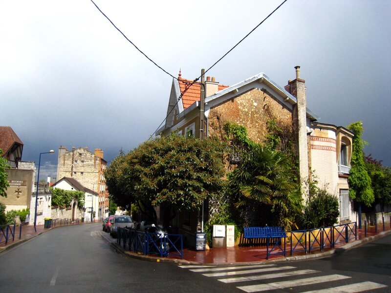 Corner house with stormy sky