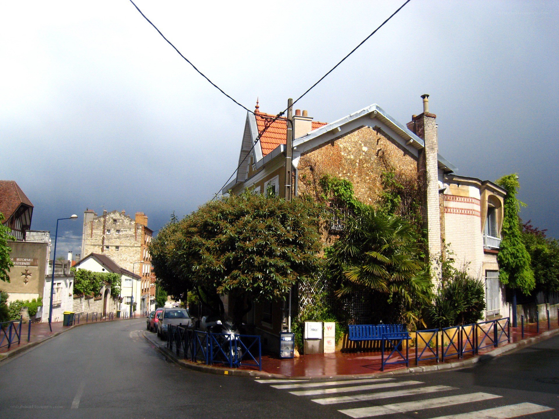 Corner house with stormy sky