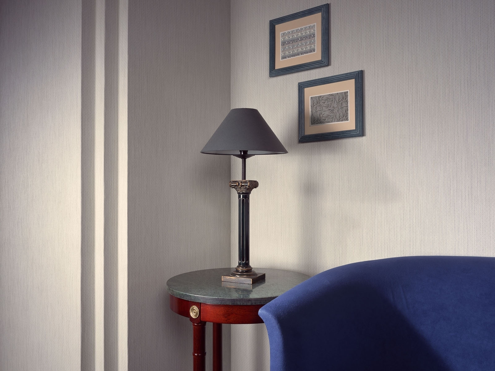 Corner table with lamp and chair