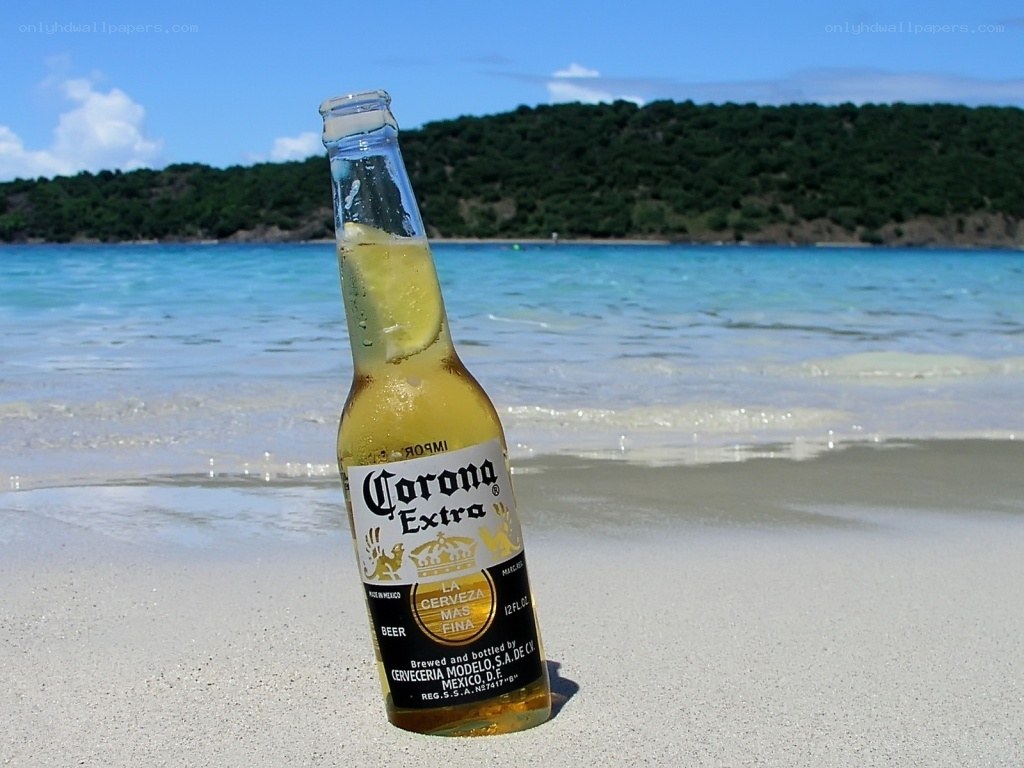 Corona bottle on beach