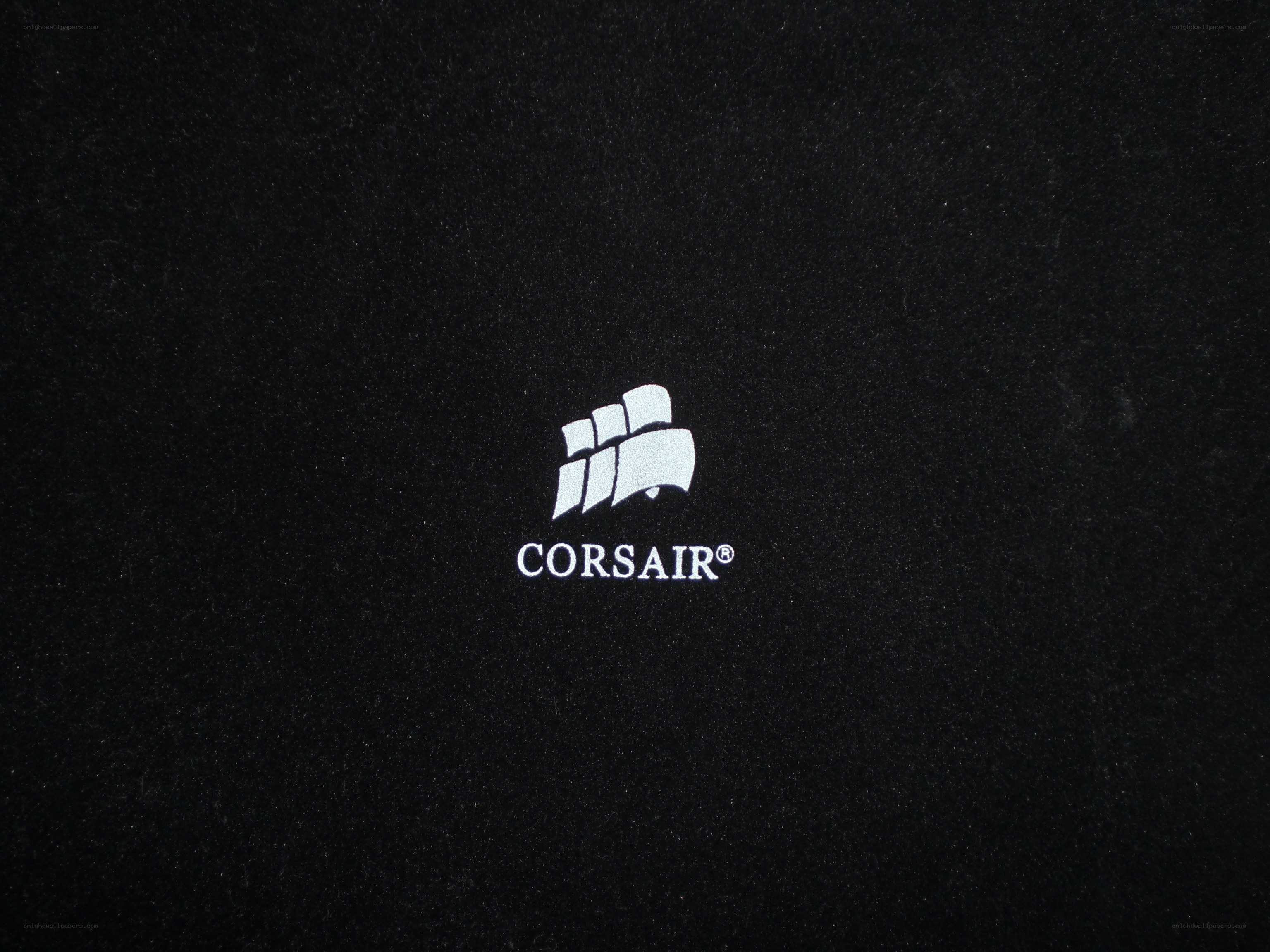 Corsair logo on black surface