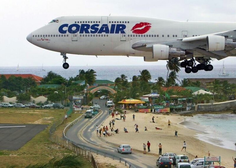 Corsair plane landing near beach