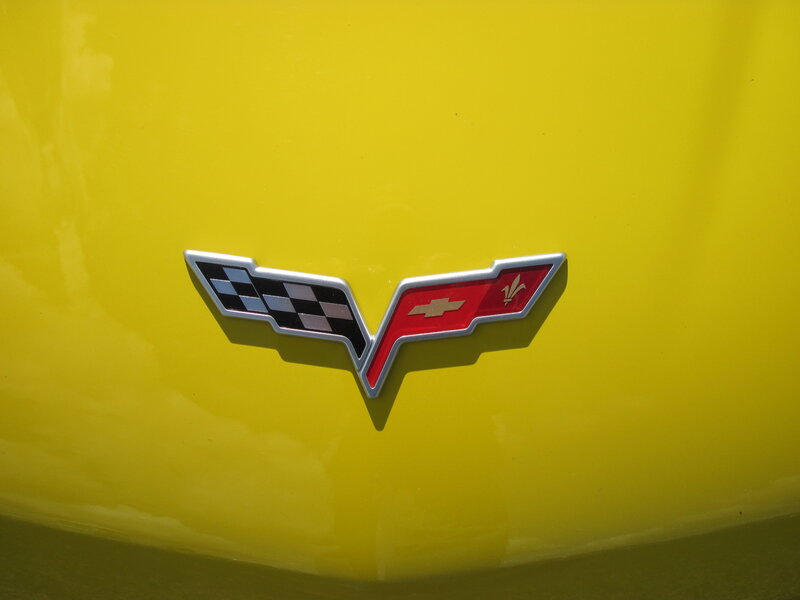 Corvette Emblem on Car — Yellow