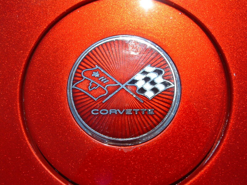 Corvette emblem on red car