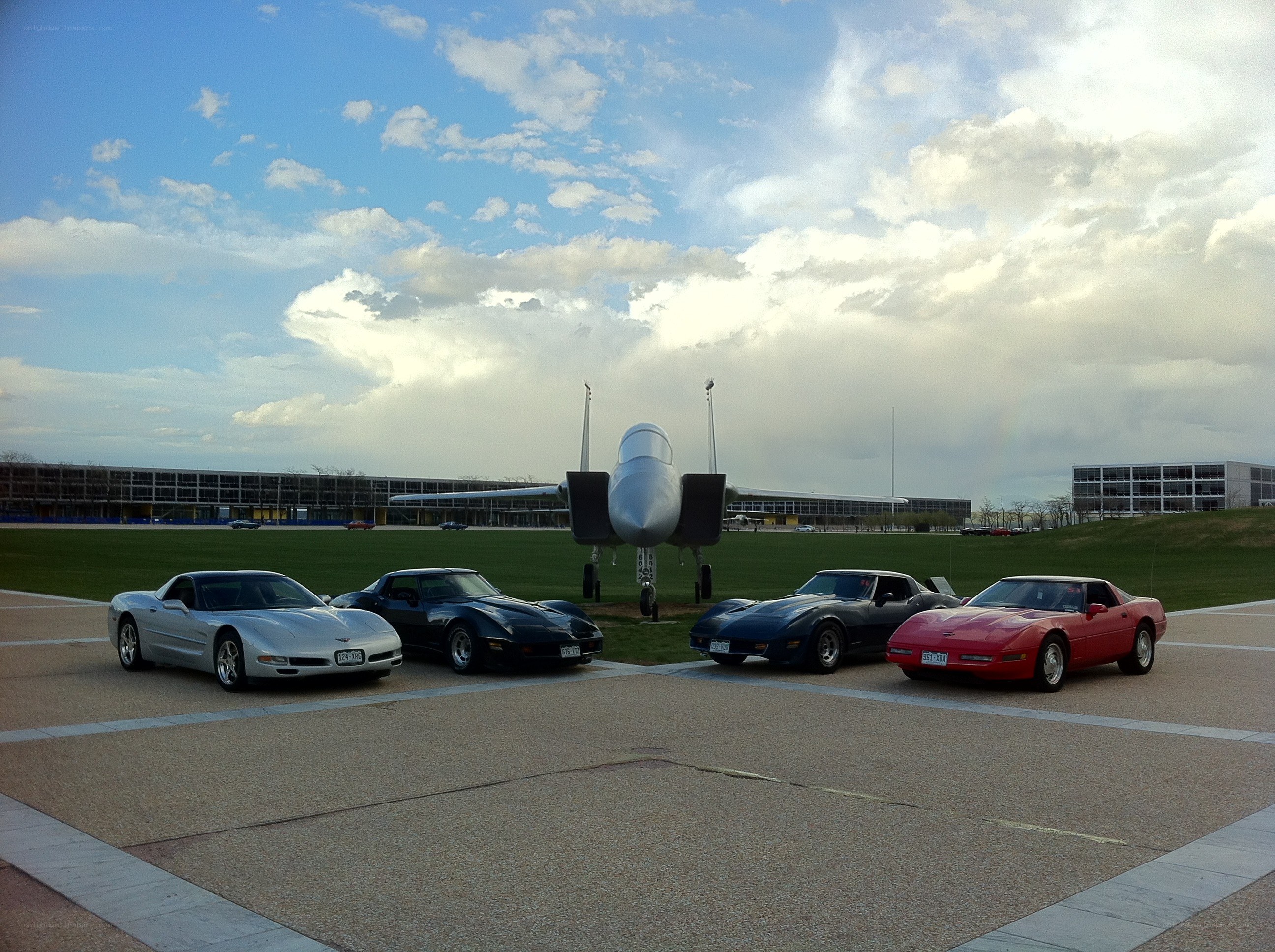 Corvettes and fighter jet display