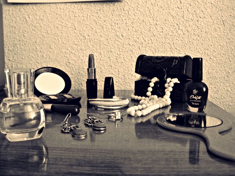 Cosmetics and Jewelry on Table