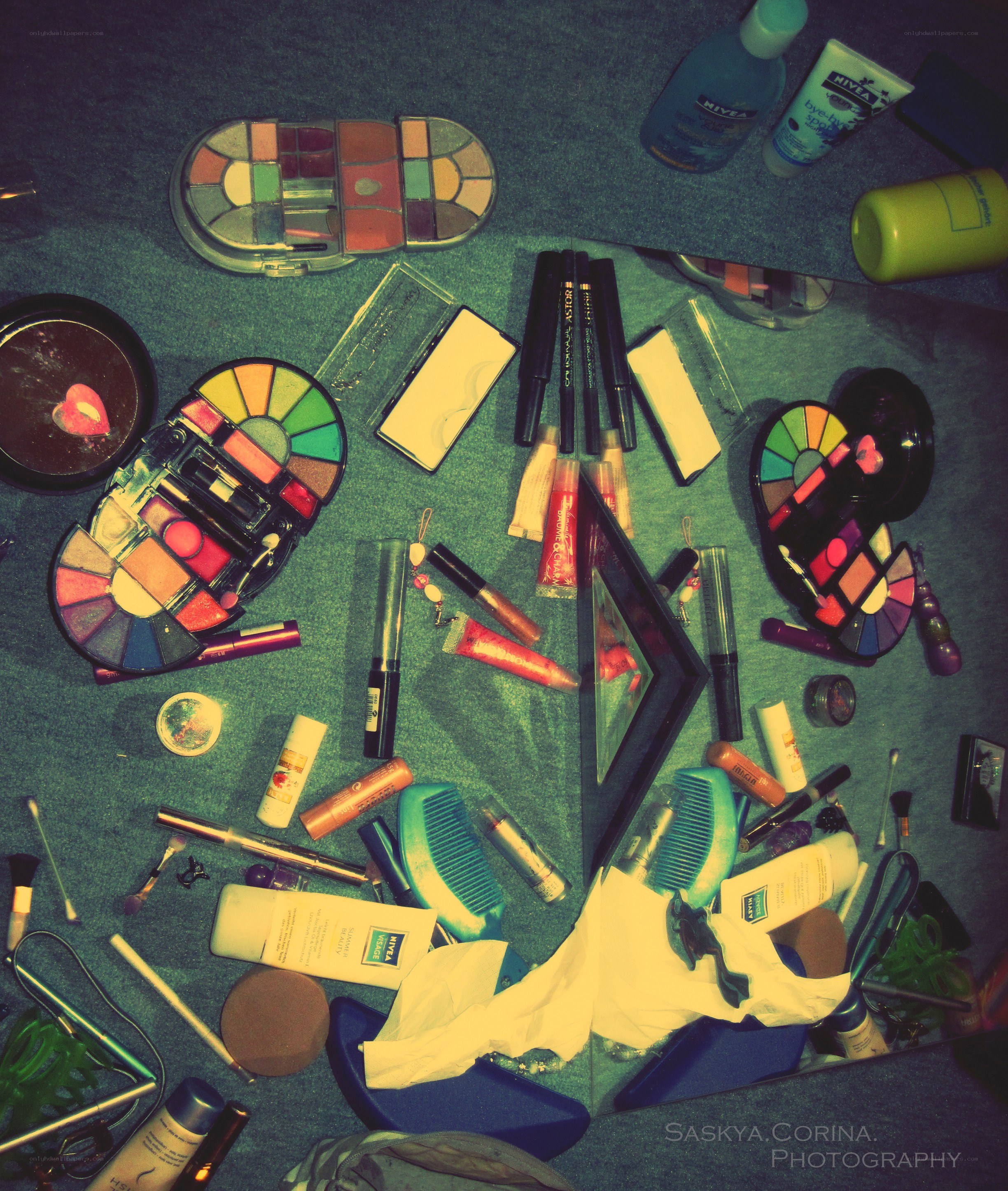 Cosmetics scattered on a table
