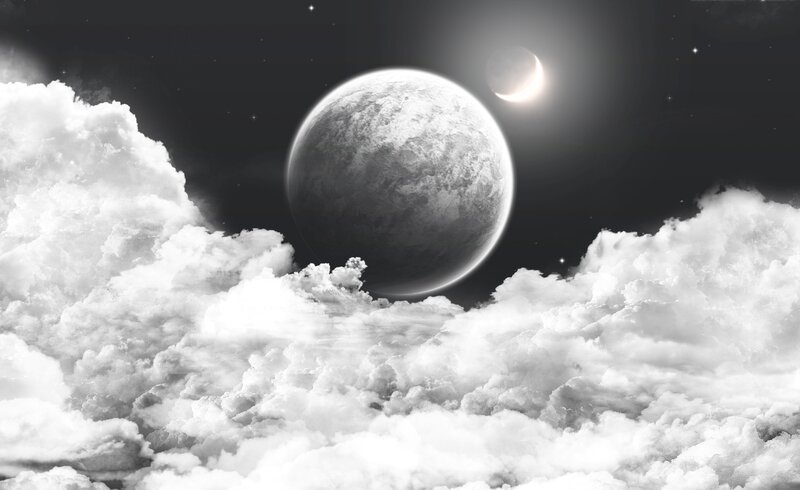 Cosmic moon over clouds