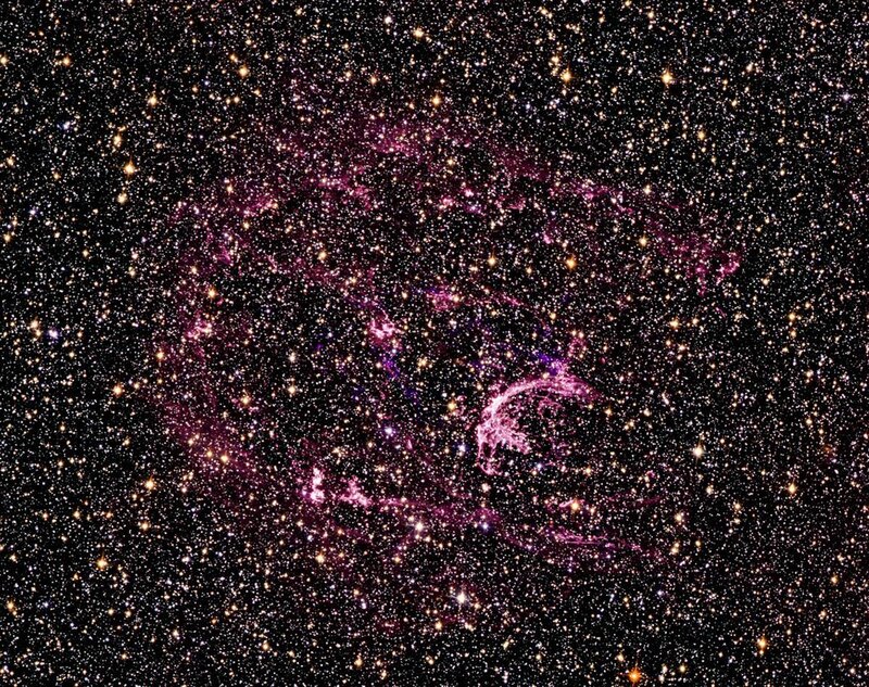 Cosmic nebula in starfield