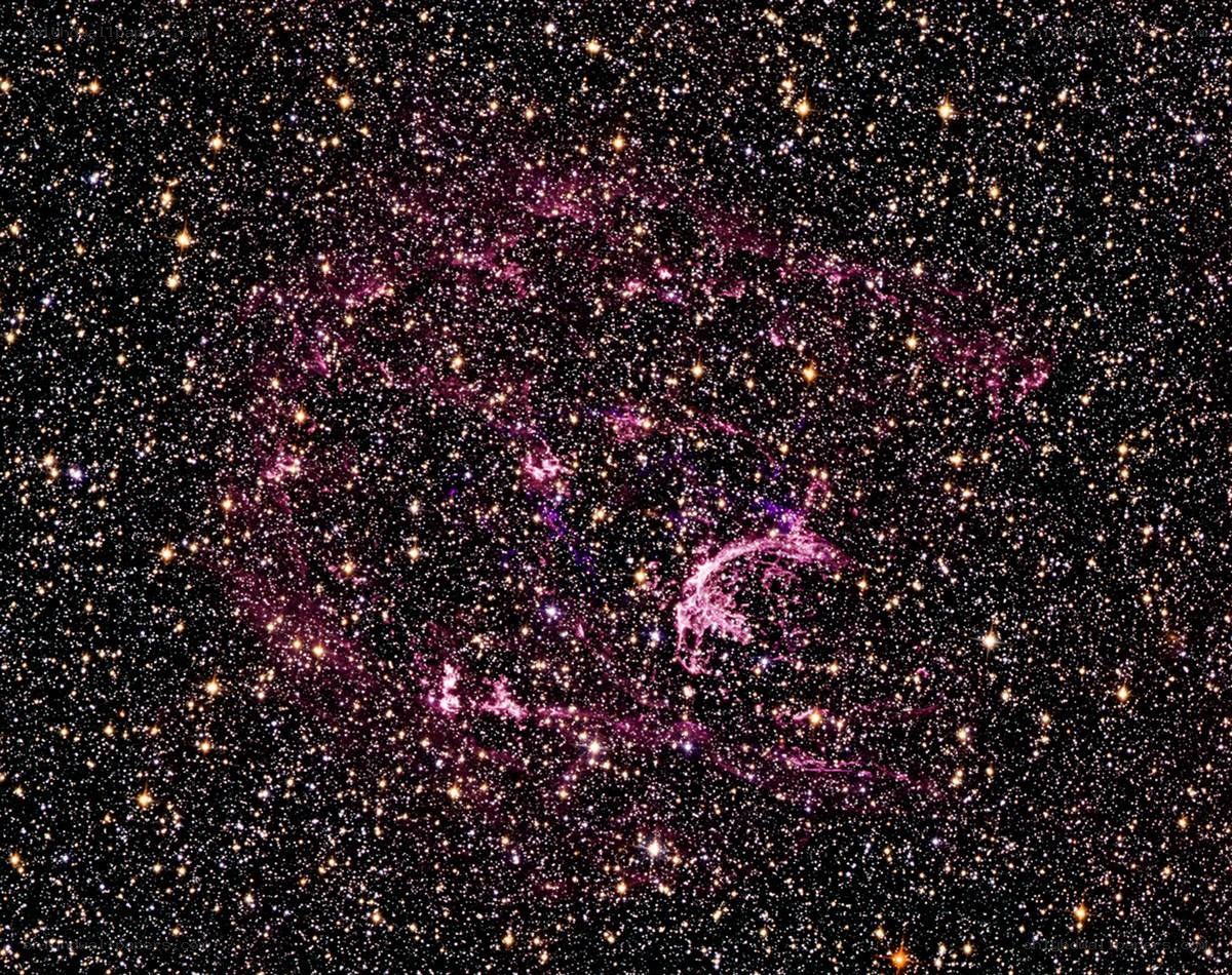 Cosmic nebula in starfield