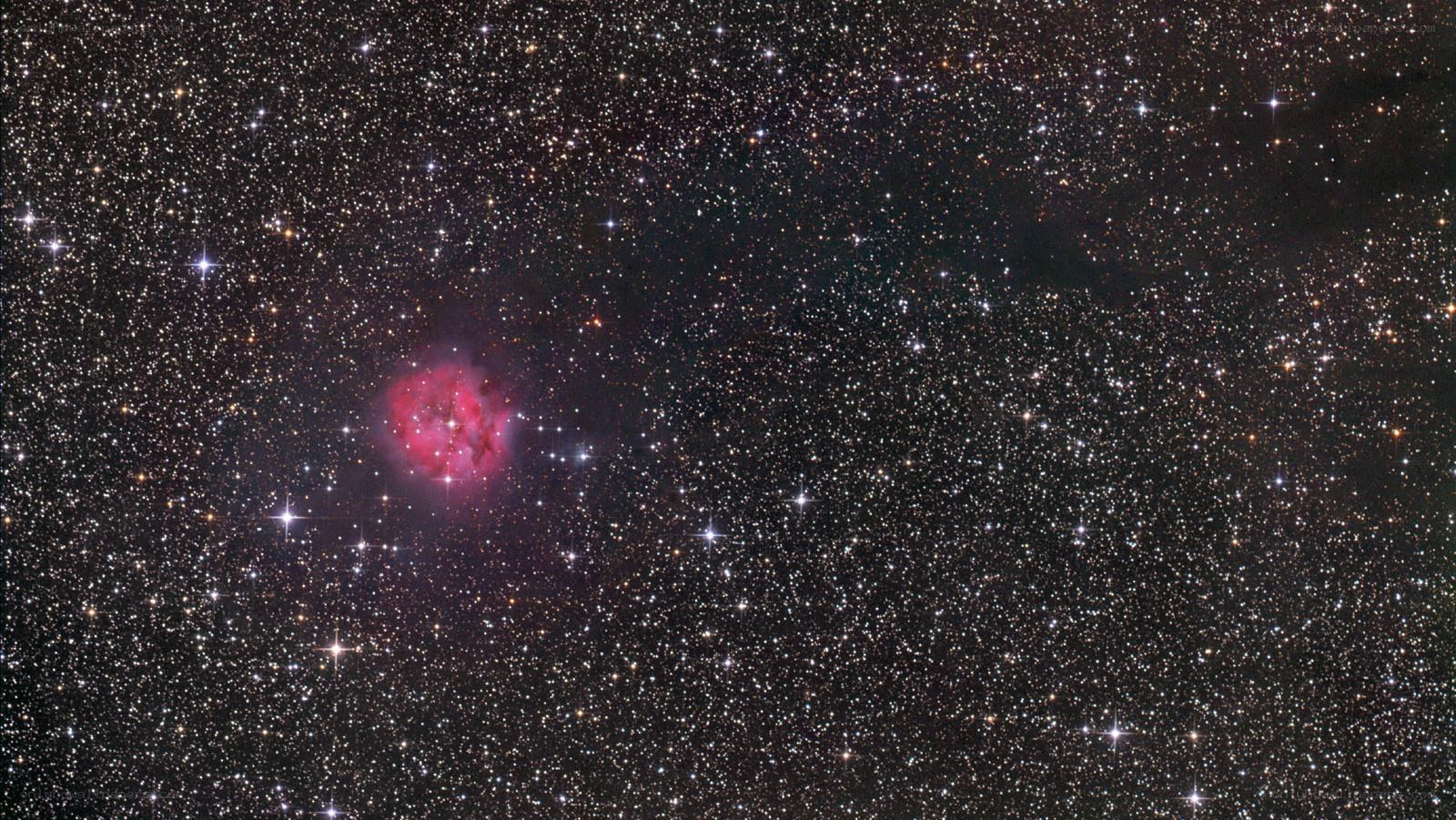 Cosmic nebula in starfield