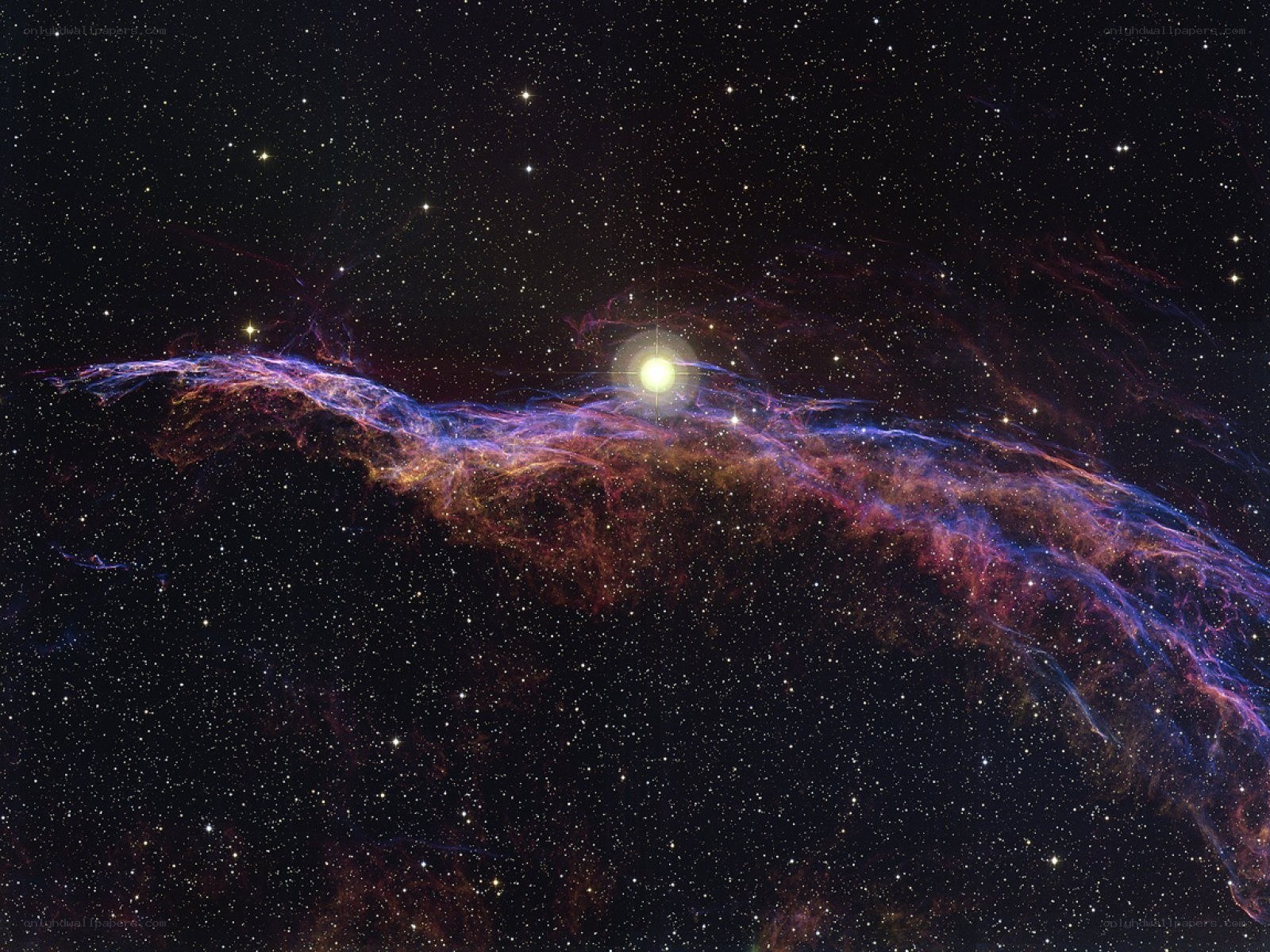 Cosmic nebula with bright star