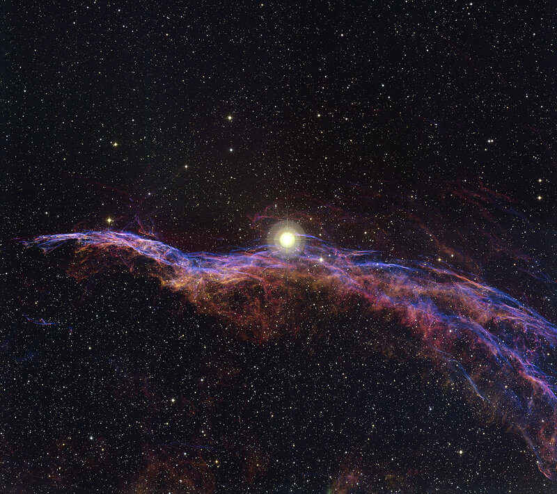 Cosmic nebula with bright star