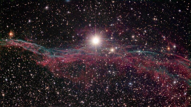 Cosmic nebula with bright star