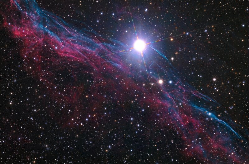 Cosmic nebula with bright star
