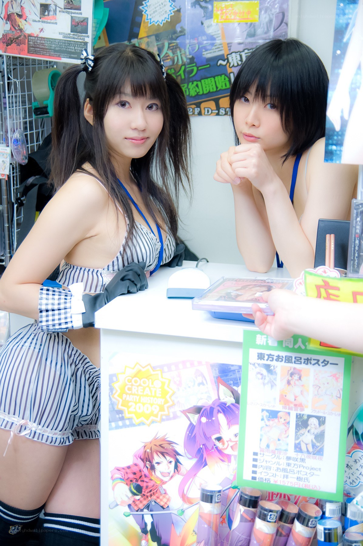 Cosplay at a convention booth