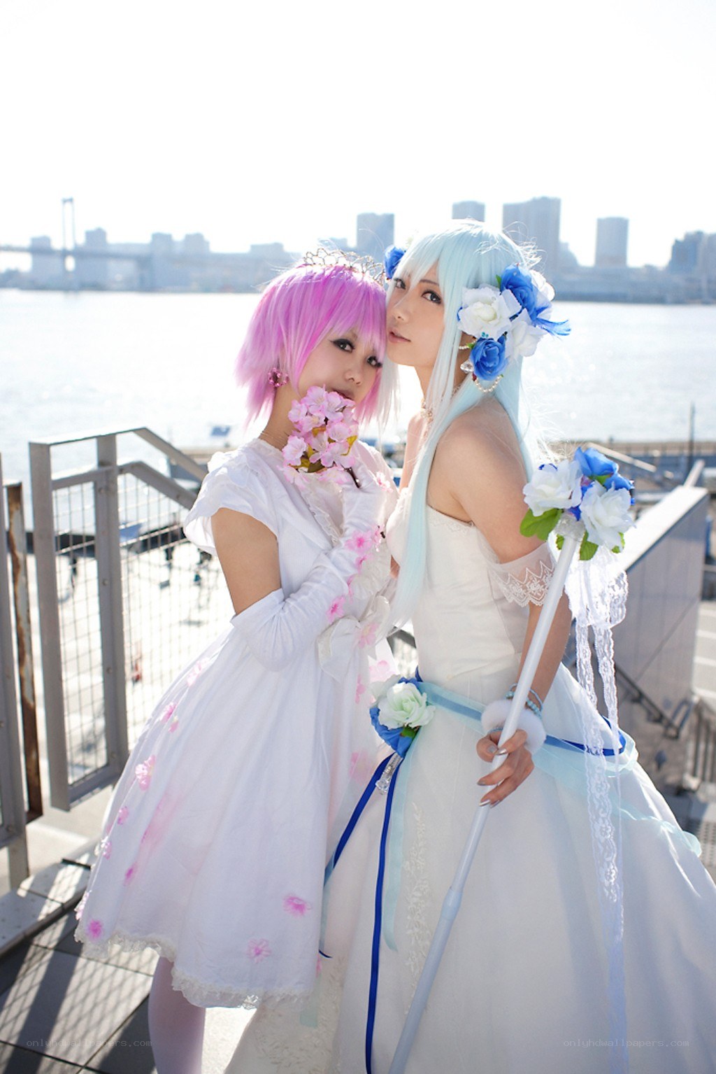 Cosplay duo by the water