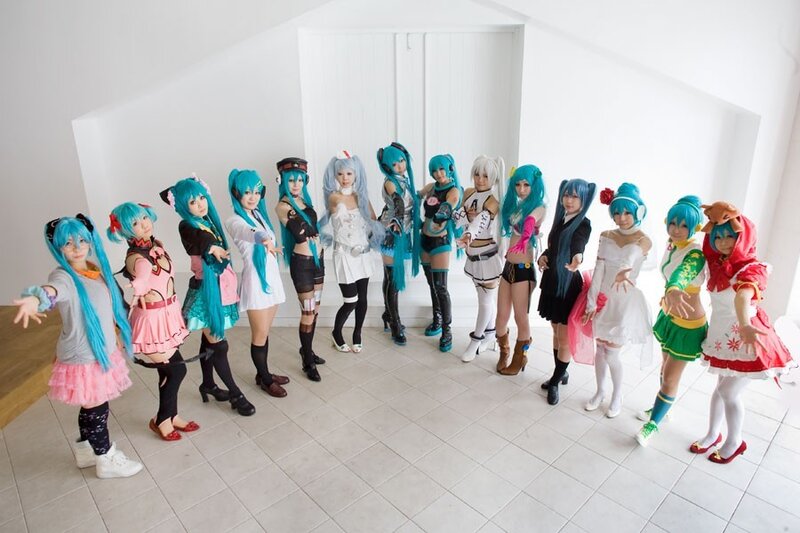 Cosplay group with blue-haired characters