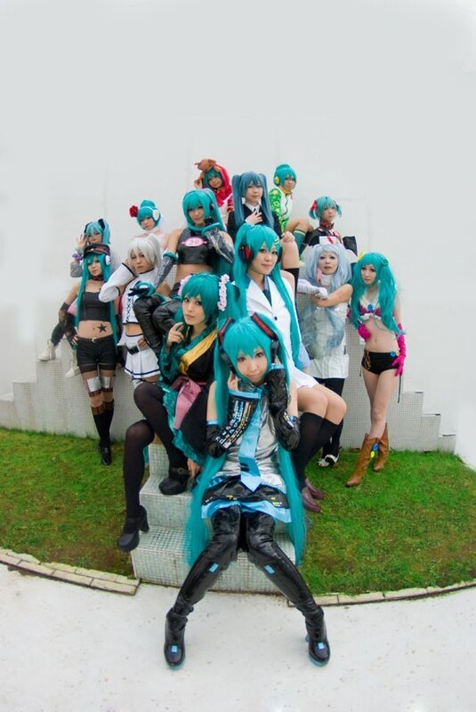cosplay group with turquoise hair