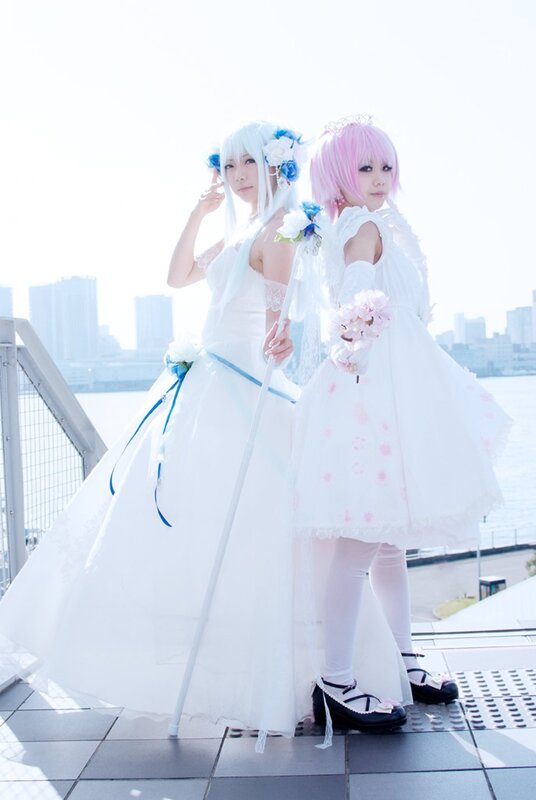 cosplay of two characters in white dresses