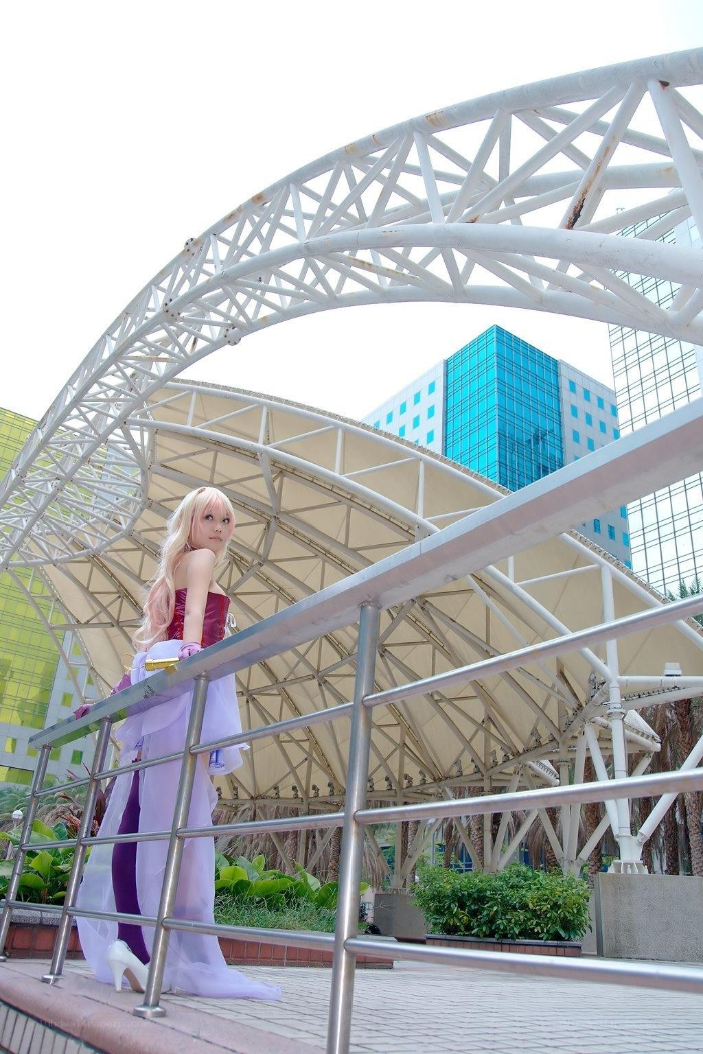 cosplayer at modern structure