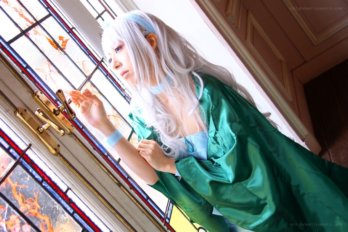cosplayer at stained glass window