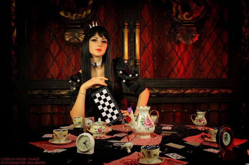 cosplayer at tea party table