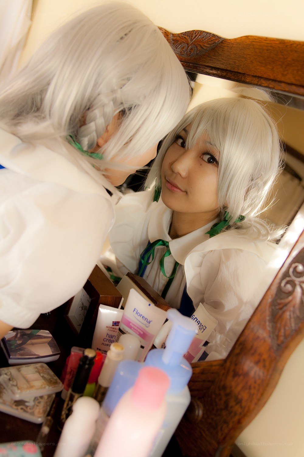 cosplayer at vanity mirror